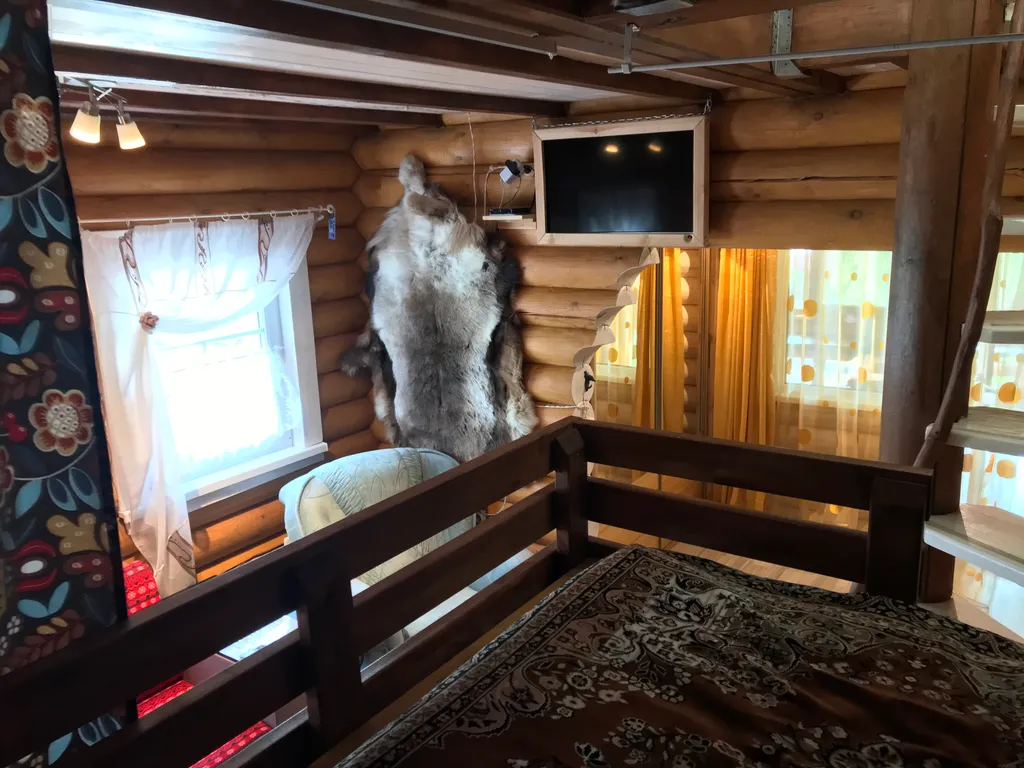 Дом из бревна Терем с сауной в черте города