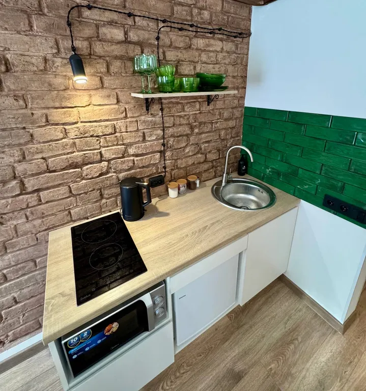 Студия Green рядом с замком от Mascaron Apartments