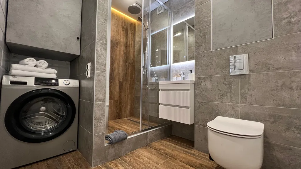 Апартамент у часовой башни и дома гильдии