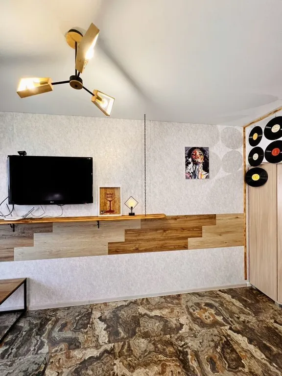 Студия с дизайнерским ремонтом