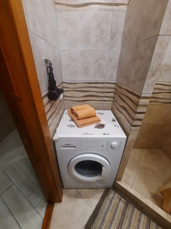 Уютная квартира в центре города с высокими потолками