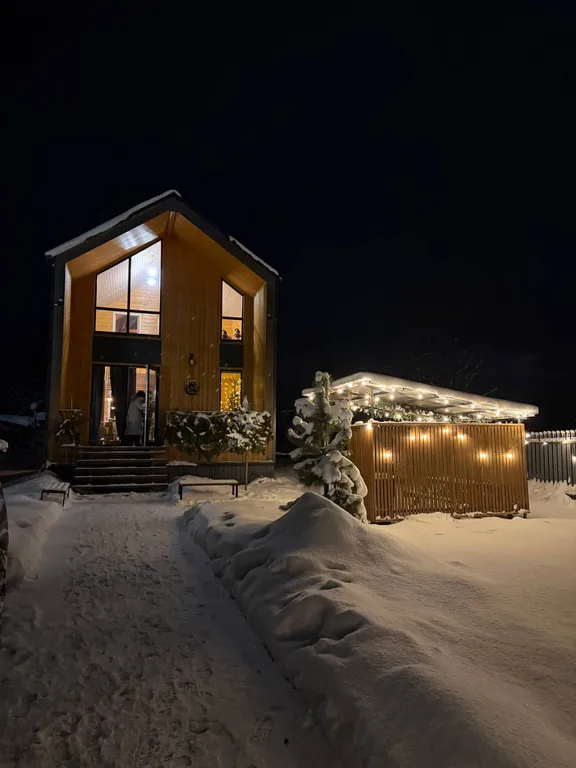 Коттедж с сауной для семейного отдыха в стиле барнхаус