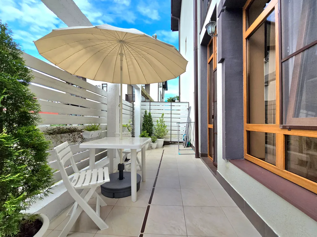 Квартира Квартира Уютная студия с выходом во дворик — Сириус