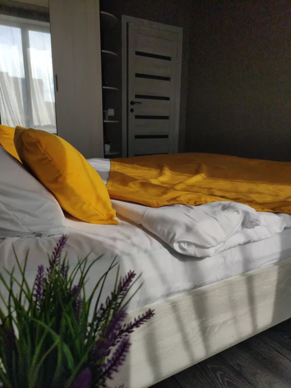 Дизайнерская и просторная квартира недалеко от центра