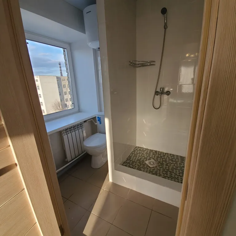 Апартаменты "Как дома" Уютная студия 9