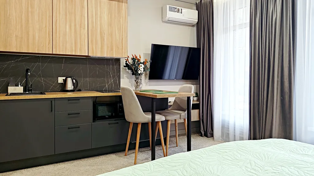 Студия с персональным выходом к шезлонгам - и вы любуетесь горами