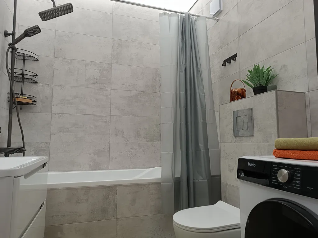 Просторная студия с 4-х местным размещением с видом на город