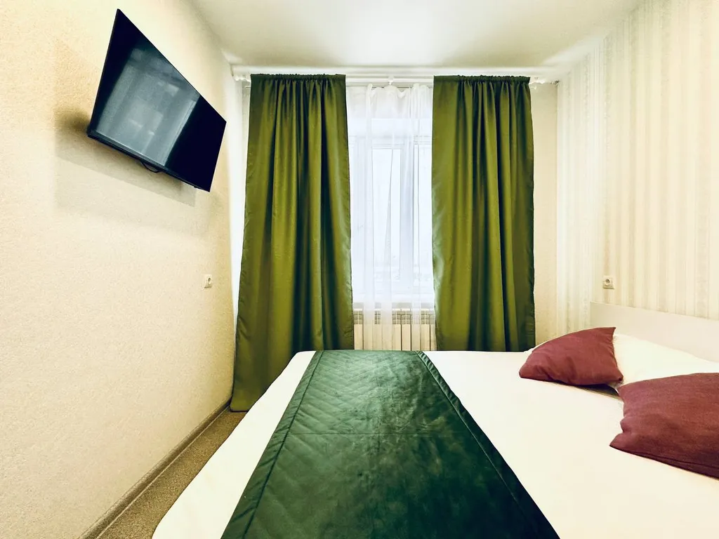 Двухместный номер с одной двуспальной кроватью