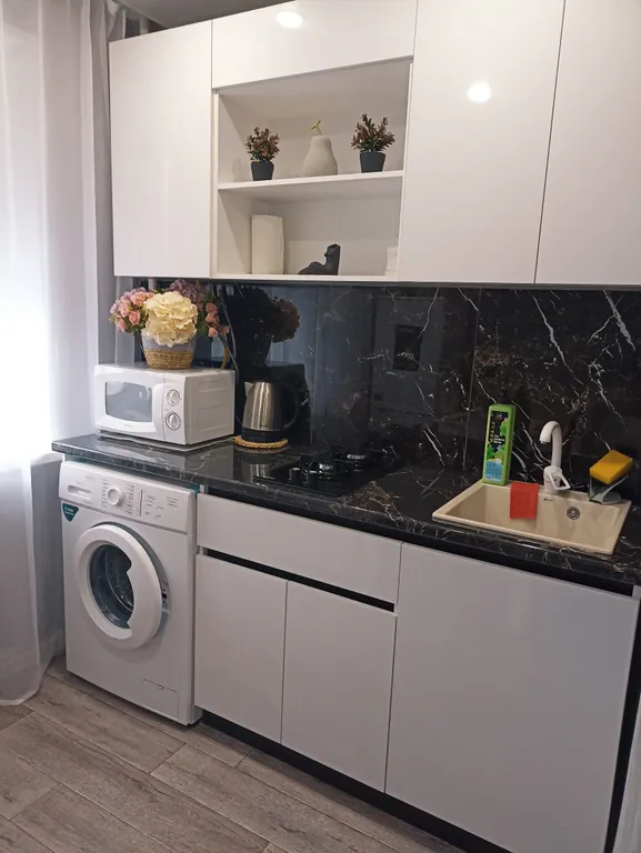 1-комнатная квартира в центре города с асфальтированной парковкой