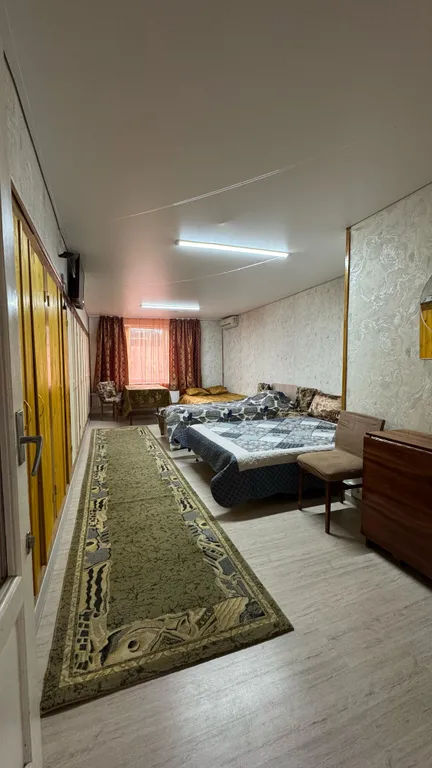 Дом-квартира с мансардой в центре