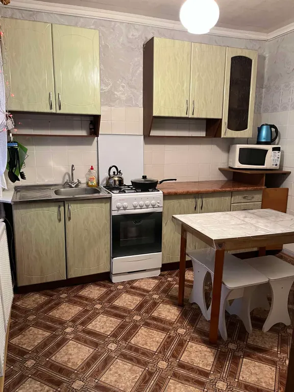 Трёхкомнатная двухуровневая квартира в центре города