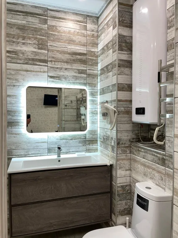 Апартаменты с уютным дизайнерскими ремонтом