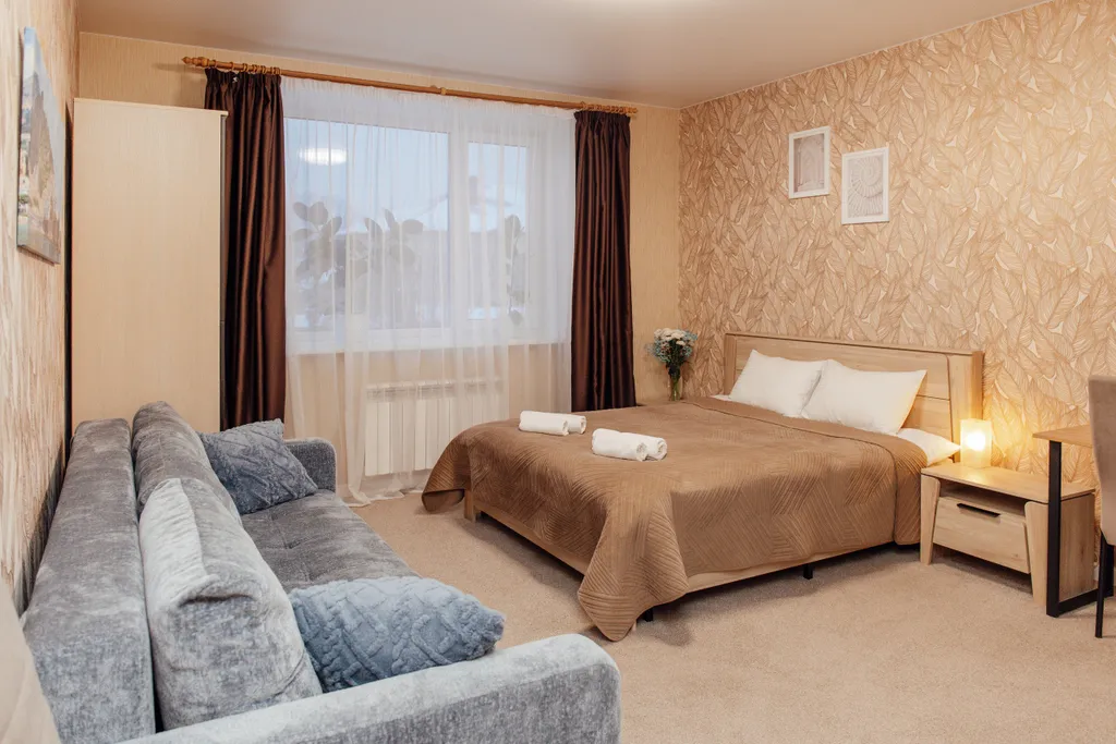 Семейный номер с двуспальной кроватью и раскладным диваном