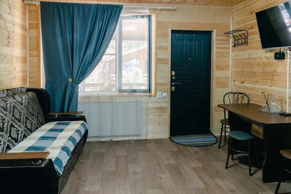 Домик номерного типа с общей террасой