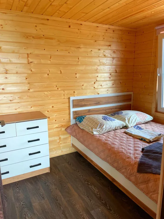 Коттедж Уютный домик на берегу озера Волго — Ланино