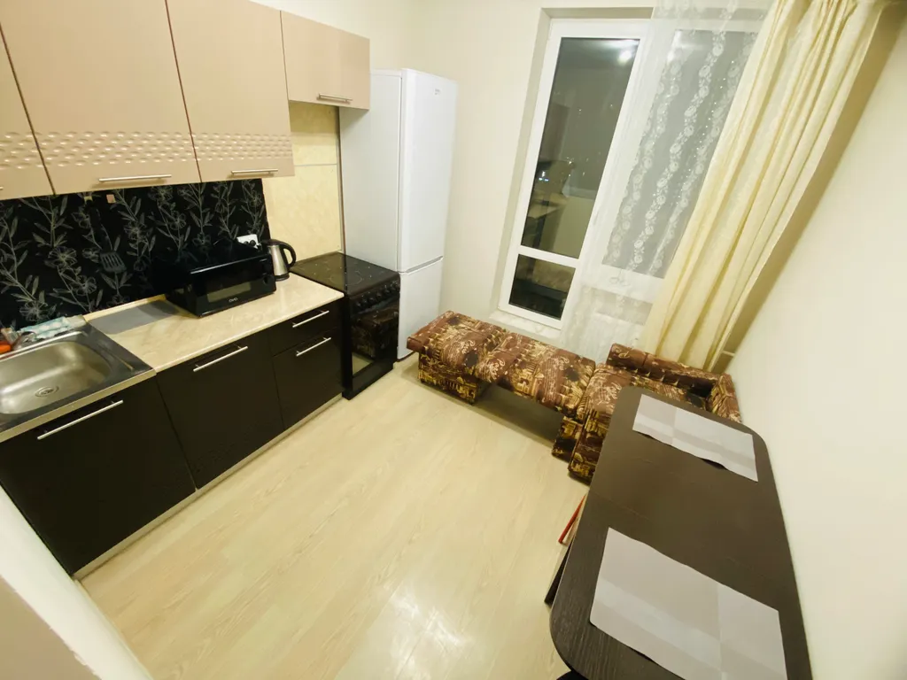 Уютная квартира с прекрасным видом на город в огнях