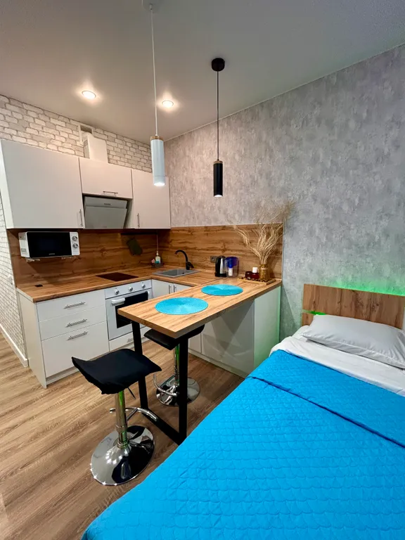 Уютная бирюзовая студия в Аквамарине