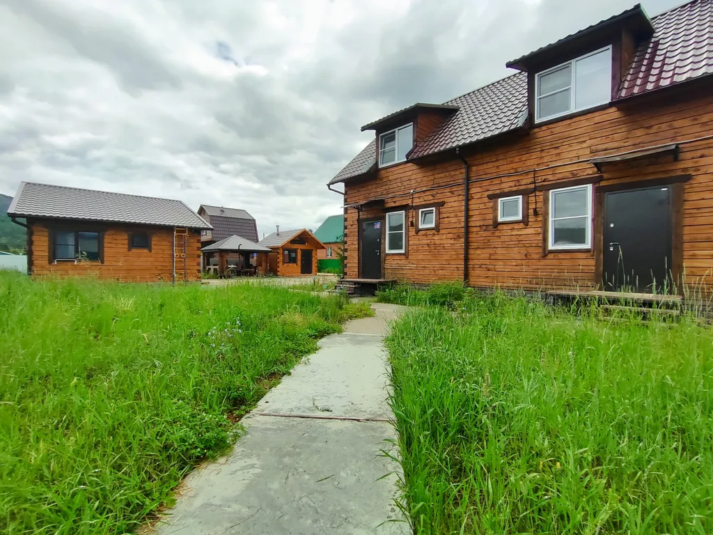 Дом с закрытой парковкой