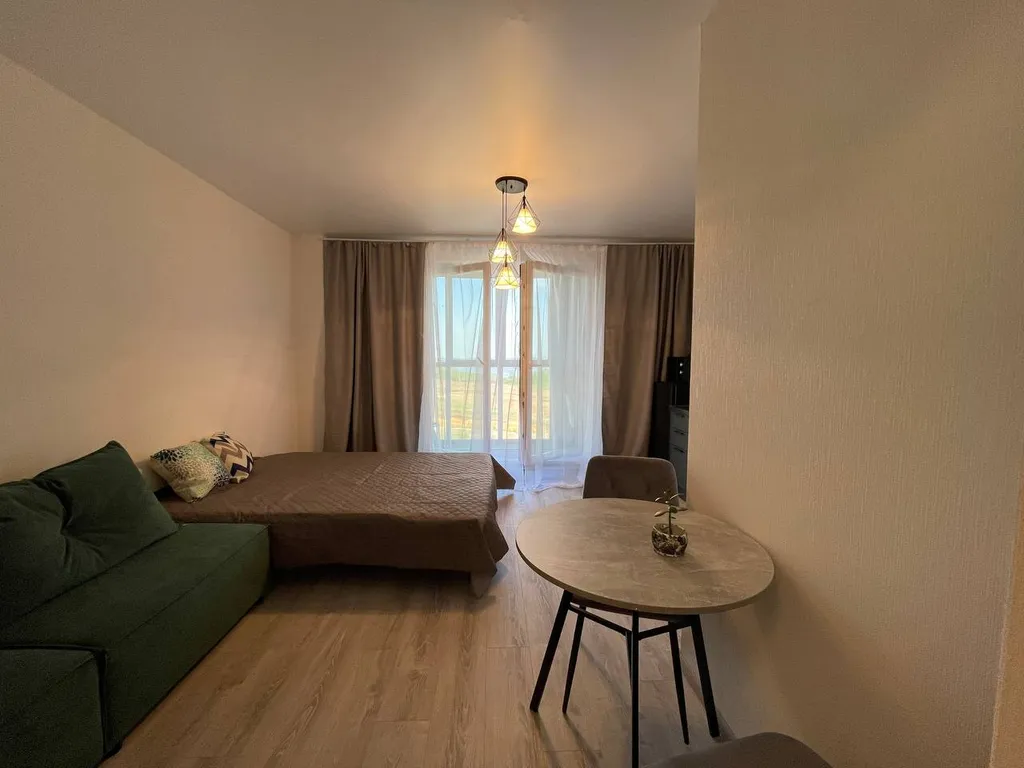 Уютная студия с видом на лес