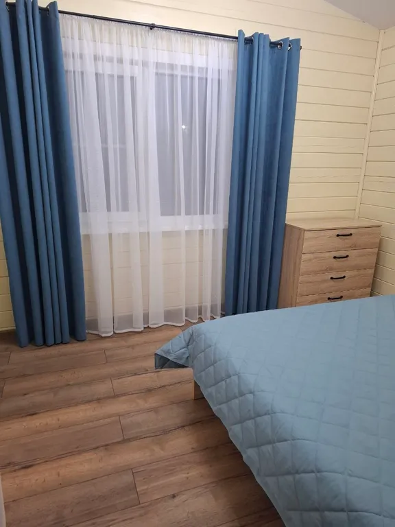 Дом с мансардой в соснах