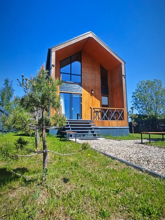 Коттедж с сауной для семейного отдыха в стиле барнхаус