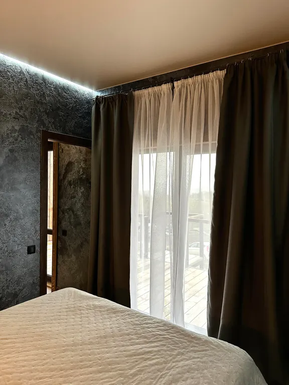 Дом с террасой на территории базы отдыха Едем в горы