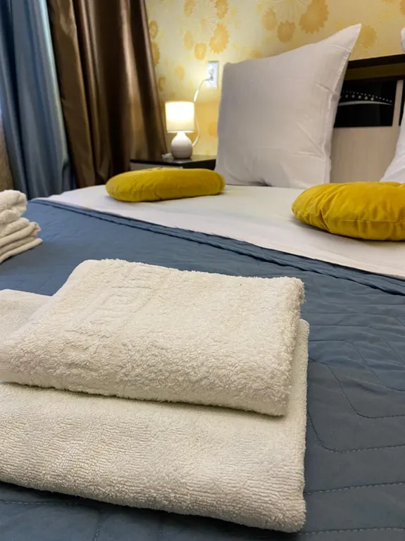 Уютная однушка в центре с двумя кроватями