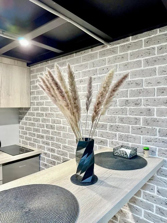 Двухуровневая студия с дизайнерским ремонтом в стиле лофт