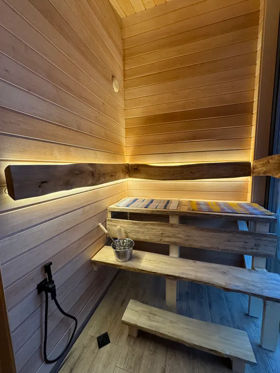 Коттедж Уютный коттедж с сауной и купелью — Бугры