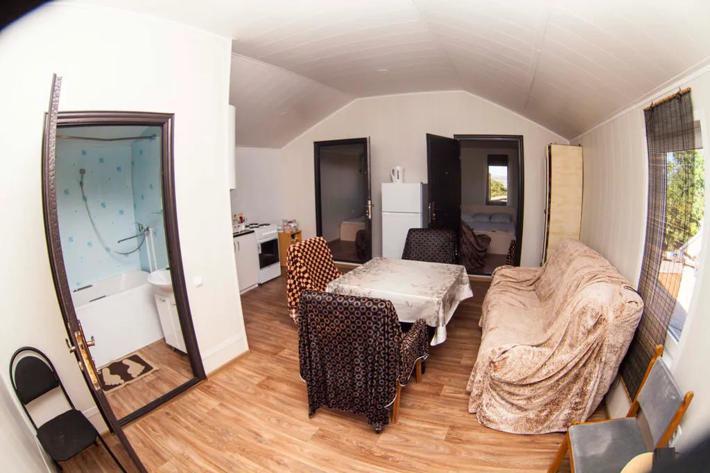 Коттедж Коттедж Уютные апартаменты с 2-мя спальнями — Ейск