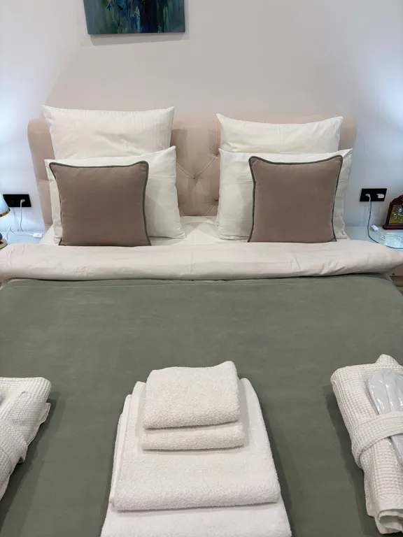 Апартаменты с видом на море с подогреваемым бассейном