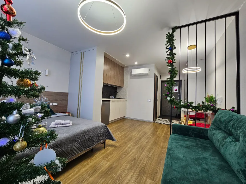 Уютная дизайнерская квартира с прекрасным видом из окна