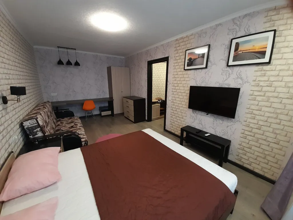 Квартира с балконом и видом на город и залив