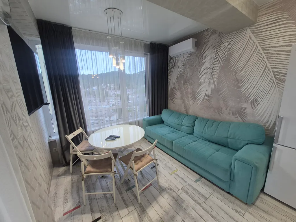 Уютная квартира с большим балконом и живописным видом на набережную