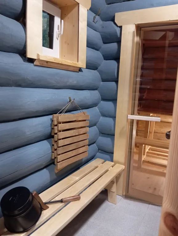 Меличуярви дом из бревна с сауной на берегу озера у самого леса