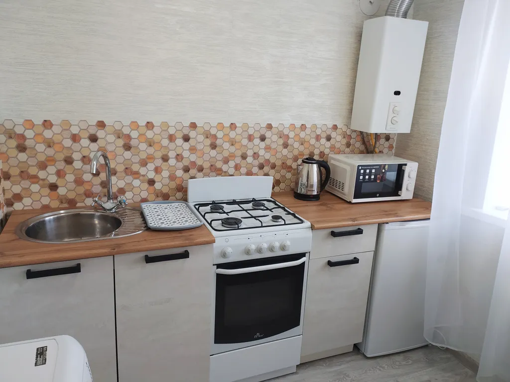 Уютная квартира (15 минут до центра на автобусе)