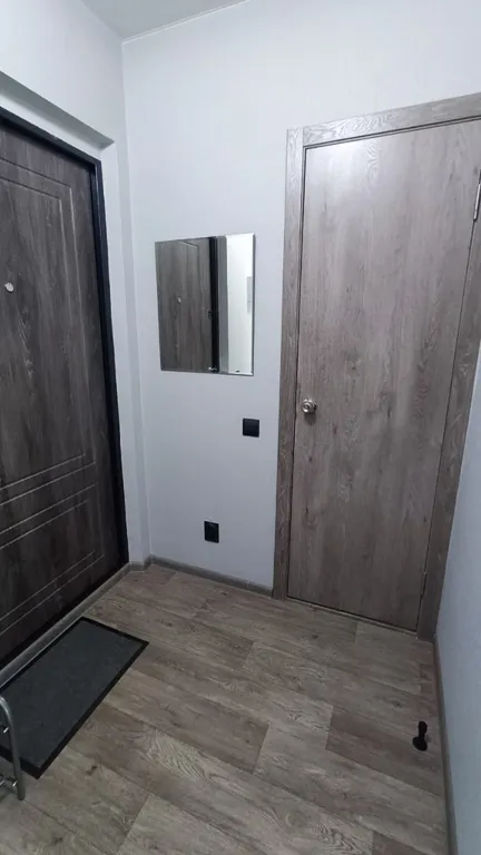 Комфортная квартира с панорамным окном в новом доме