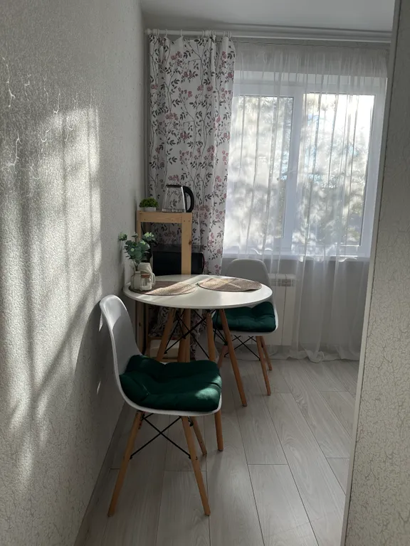 Квартира с видом на ели