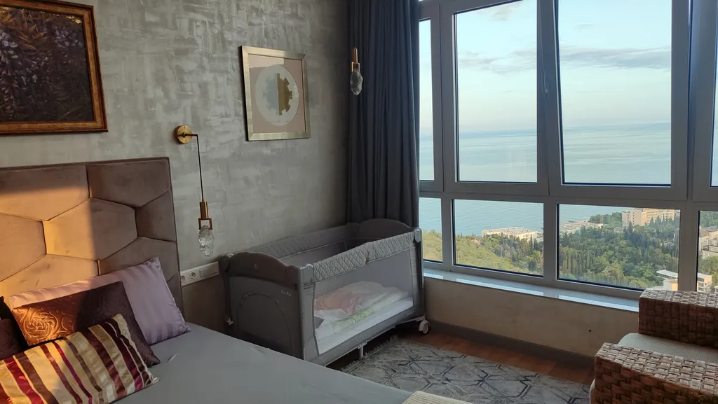 Апартамент Любимое Небо - море и горы - наслаждаться лежа на кровати