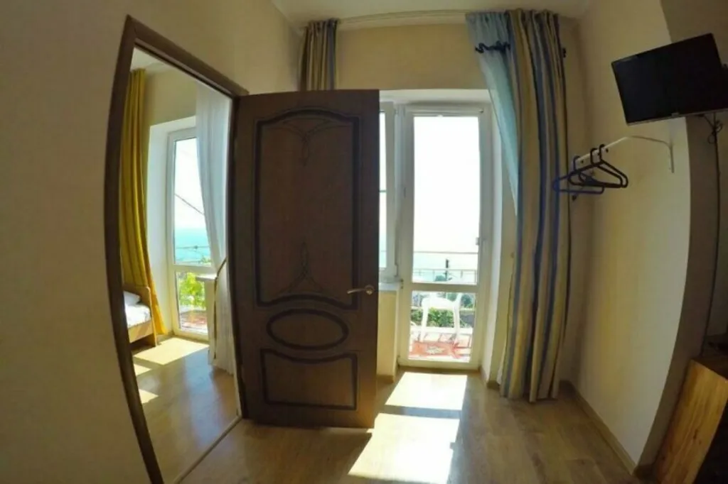 Квартира Квартира Четырехместный номер люкс с доп. местом и балконом с видом на море — Лазаревское