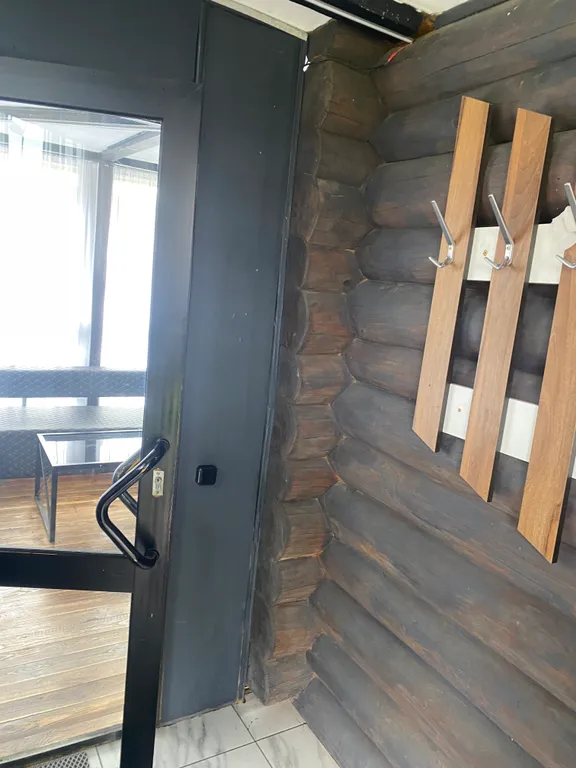 Деревенский дом с баней и террасой на берегу водоема