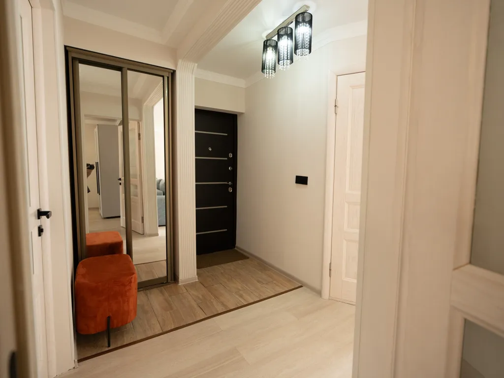 Дизайнерская квартира с видом на горы в центре Домбая