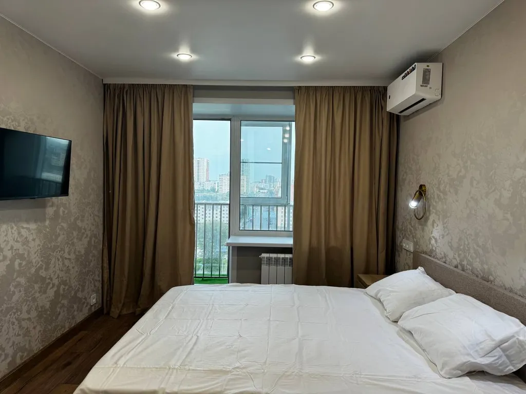 Современная квартира с шикарным видом на центр города и фонтаны