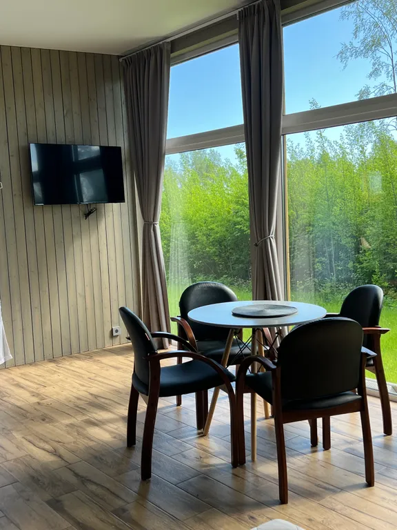 Новый современный дом с просторной кухней-гостиной