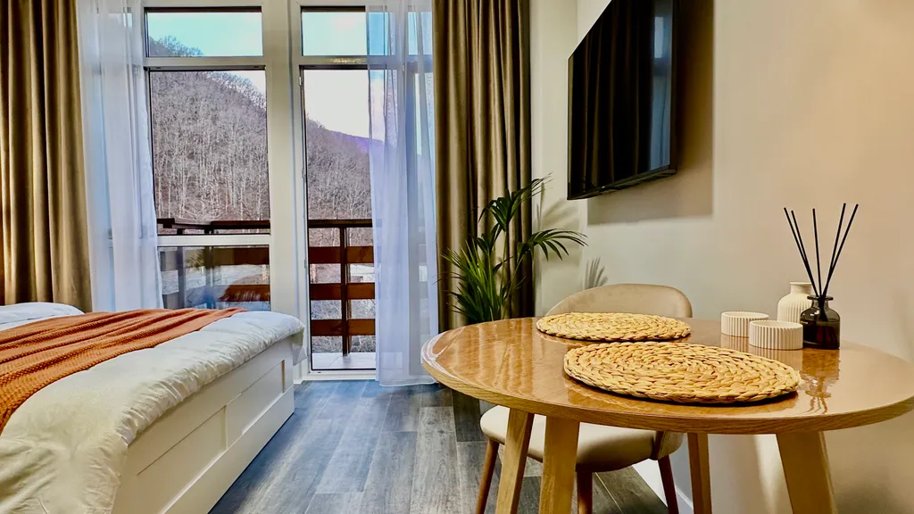 #58 Стильные апартаменты с видом на горы