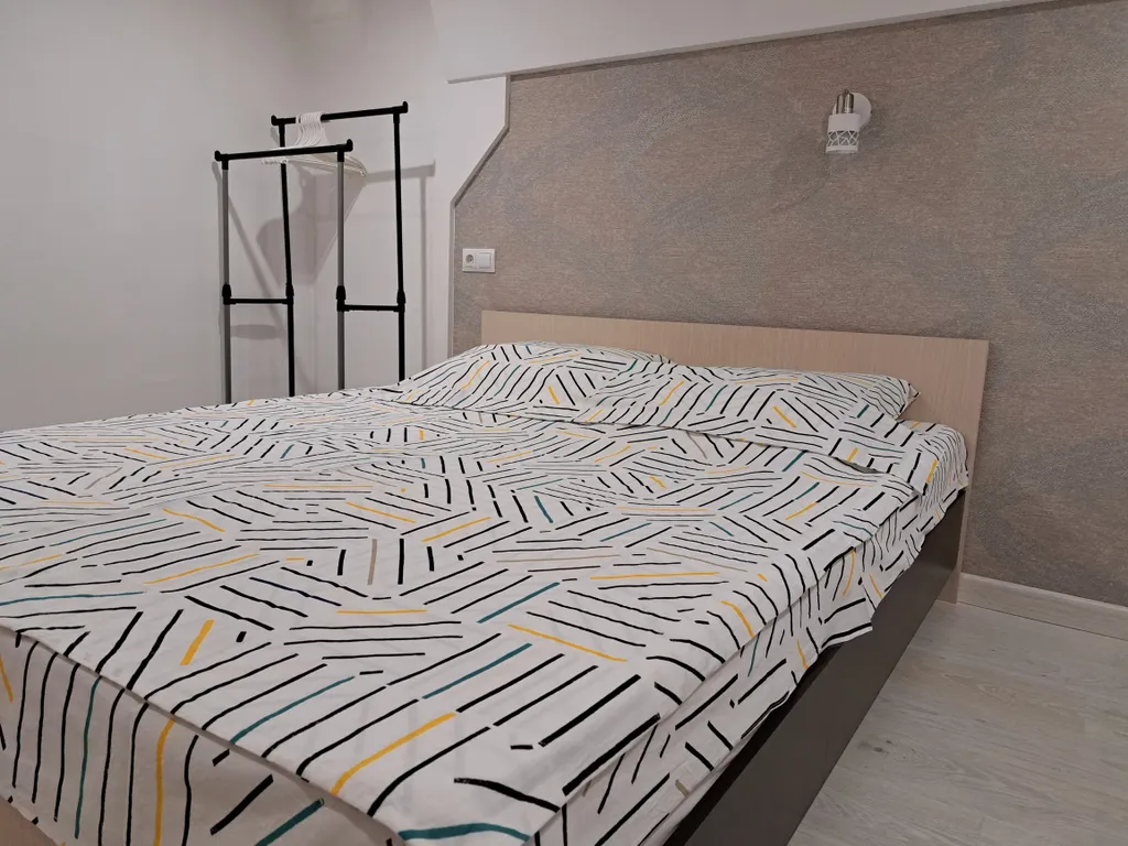 Стильная и уютная двухъярусная студия