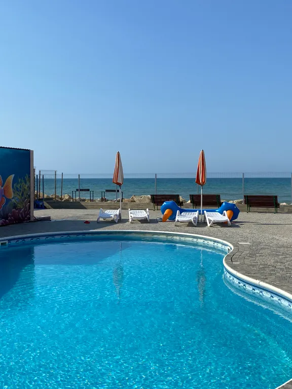 Уютные апартаменты с бассейном на берегу моря