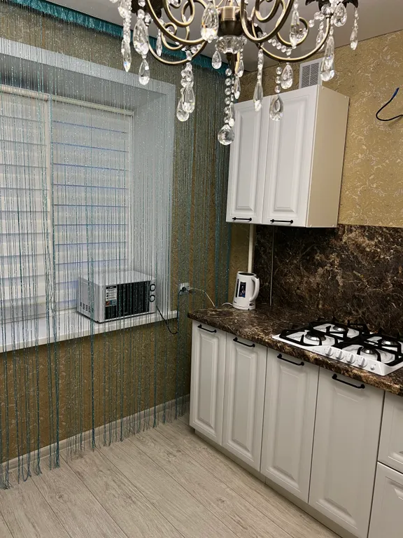 Уютная квартира в центре города, 1 минута до кафе с бизнес-ланчами