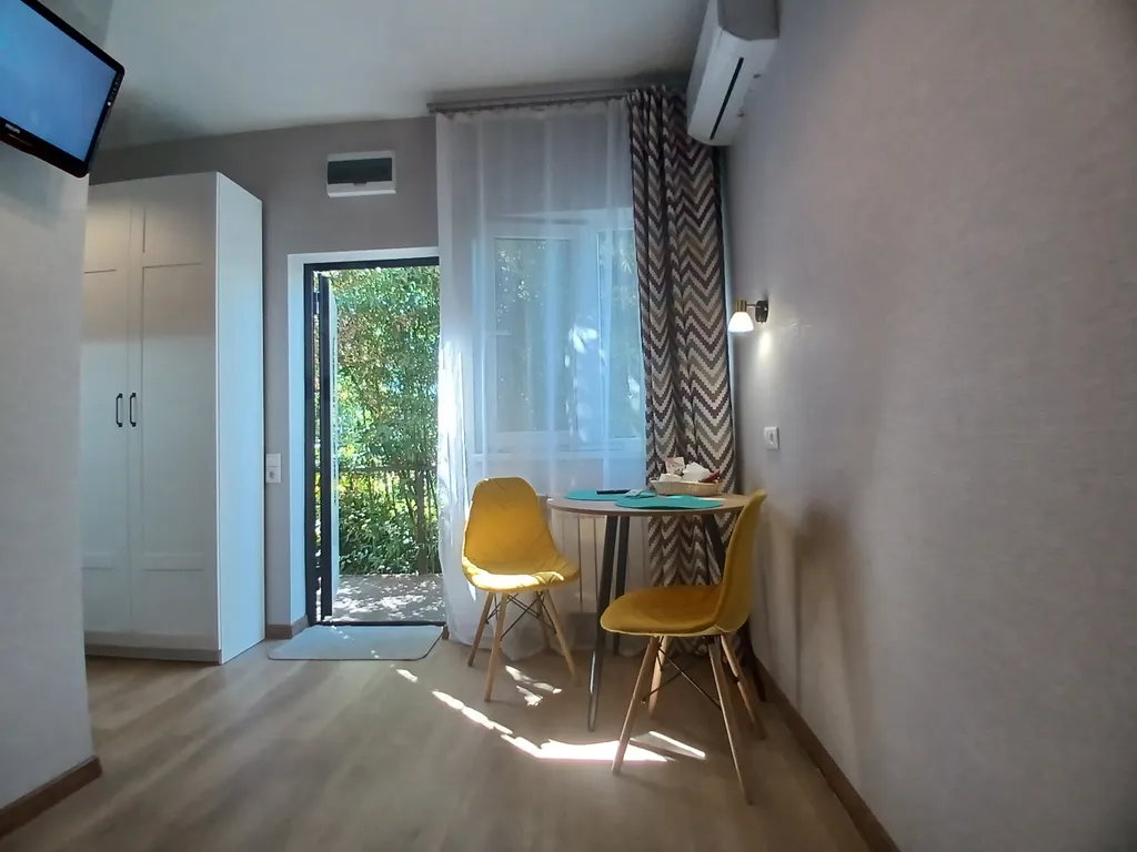 Апартаменты Terrazza рядом с вокзалом, с террасой, комфортные и уютные