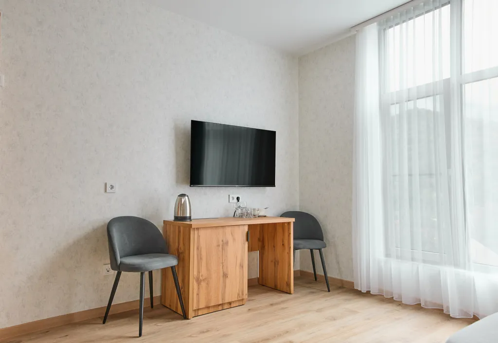 Панорамный двухместный апартамент комфорт с мини-кухней и балконом